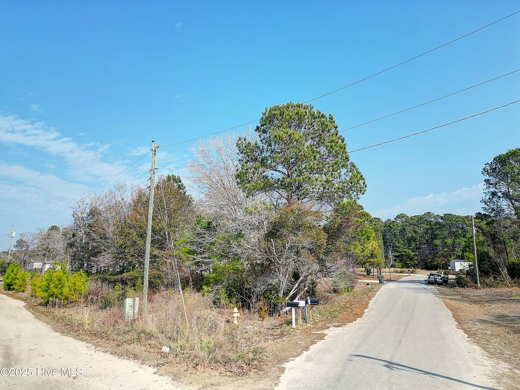 Photo of 1602 Little Shallotte River Drive SW, Shallotte, NC 28470 (MLS # 100488041)