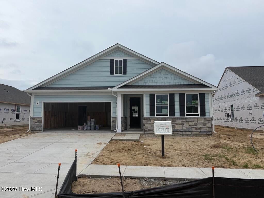 Photo of 4289 Farmfield Drive, Navassa, NC 28451 (MLS # 100606439)