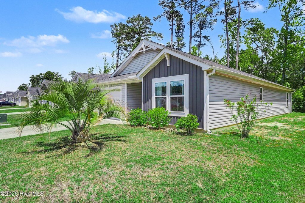 Photo of 777 Landmark Cove, Carolina Shores, NC 28467 (MLS # 100571890)
