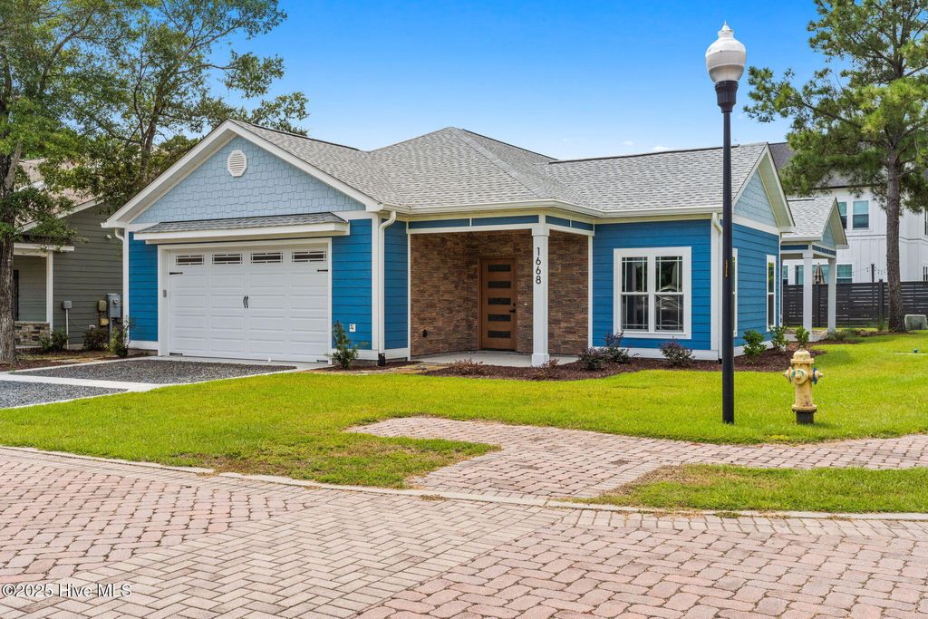 Photo of 1668 Back Bay Drive SW, Shallotte, NC 28470 (MLS # 100530218)