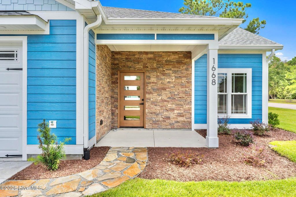 Photo of 1668 Back Bay Drive SW, Shallotte, NC 28470 (MLS # 100530218)