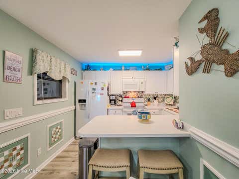 Tiny photo for 1896 New River Inlet Road #1306, North Topsail Beach, NC 28460 (MLS # 100591583)