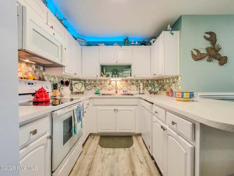 Tiny photo for 1896 New River Inlet Road #1306, North Topsail Beach, NC 28460 (MLS # 100591583)
