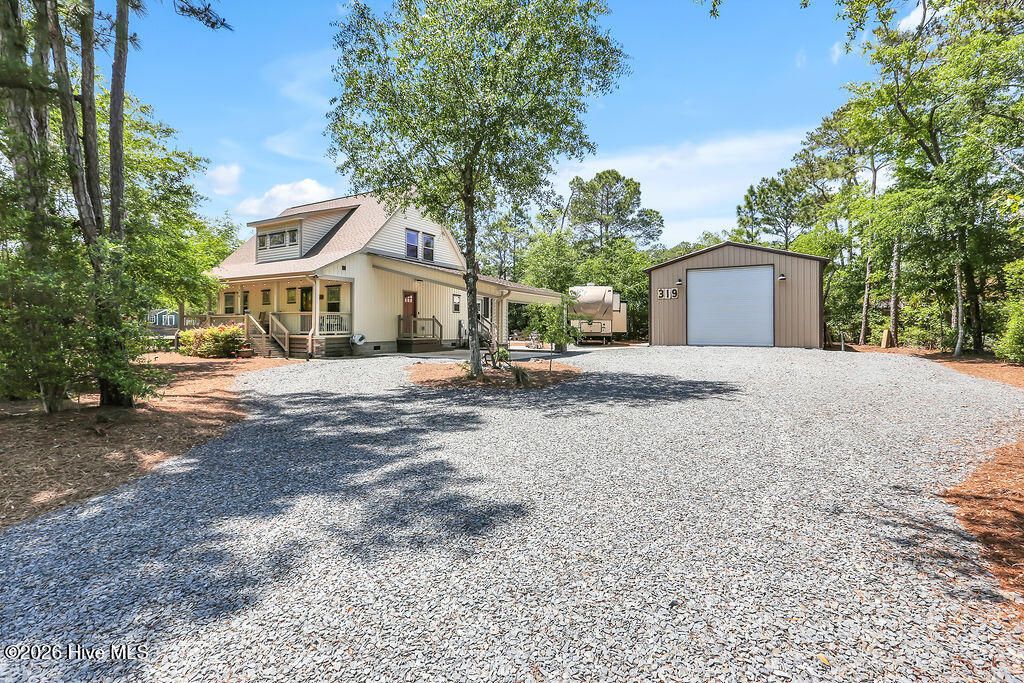 Photo of 319 NE 42nd Street, Oak Island, NC 28465 (MLS # 100572325)