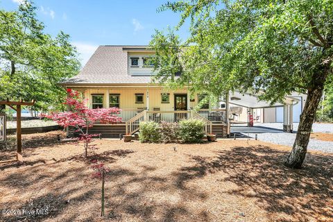 Photo of 319 NE 42nd Street, Oak Island, NC 28465 (MLS # 100572325)