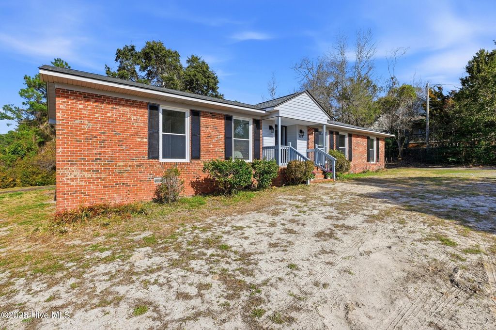 Photo of 718 Hughes Road, Hampstead, NC 28443 (MLS # 100571134)