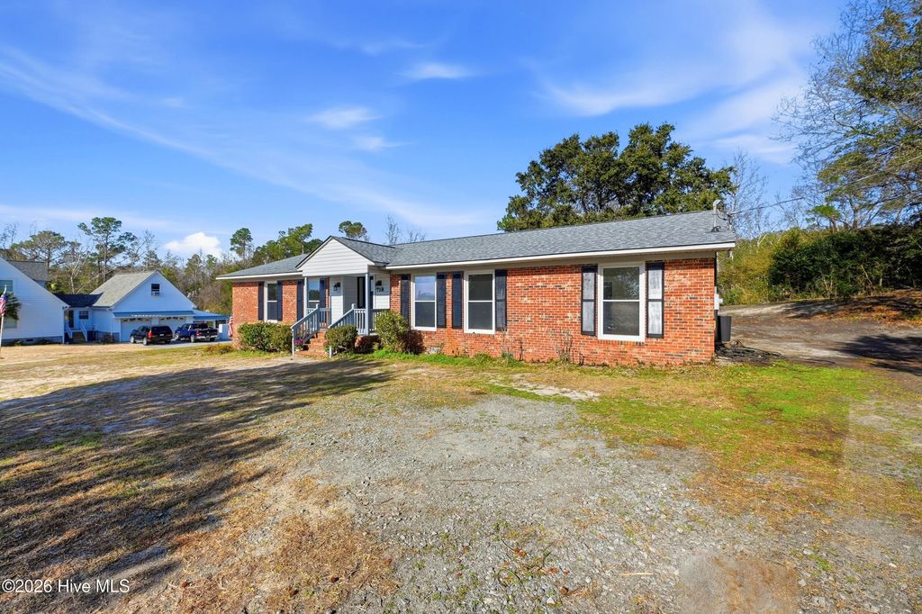 Photo of 718 Hughes Road, Hampstead, NC 28443 (MLS # 100571134)