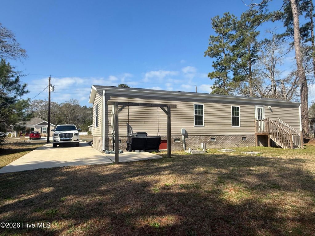 Photo of 1861 Whispering Pine Street SW, Ocean Isle Beach, NC 28469 (MLS # 100558789)
