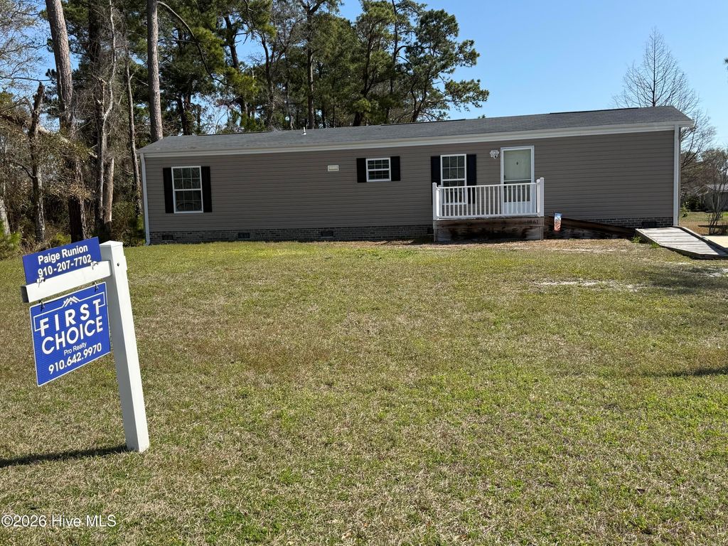 Photo of 1861 Whispering Pine Street SW, Ocean Isle Beach, NC 28469 (MLS # 100558789)