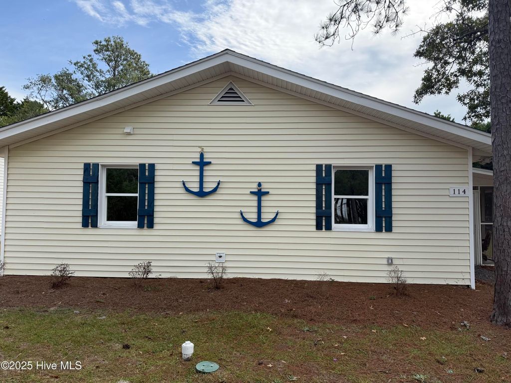 Photo of 114 NW 14th Street, Oak Island, NC 28465 (MLS # 100501720)