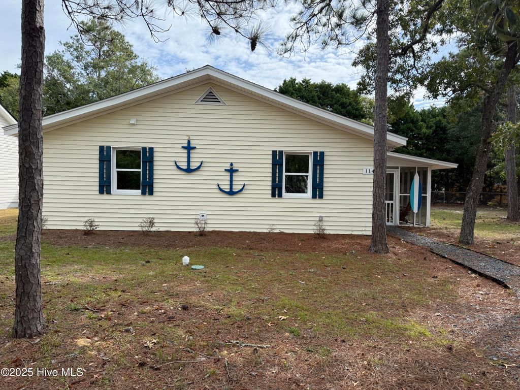 Photo of 114 NW 14th Street, Oak Island, NC 28465 (MLS # 100501720)