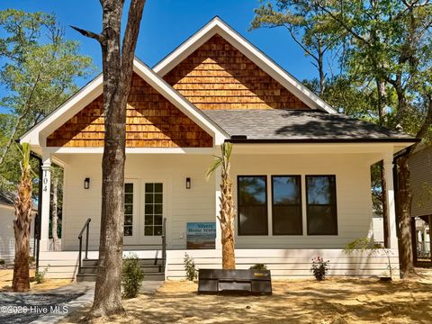 Photo of 104 NW 23rd Street, Oak Island, NC 28465 (MLS # 100576173)