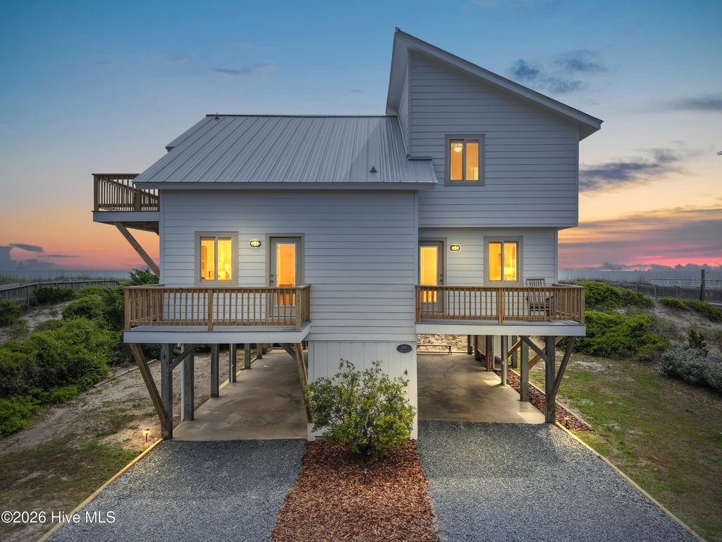 Photo of 645 Caswell Beach Road, Oak Island, NC 28465 (MLS # 100569528)