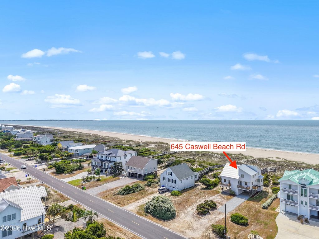 Photo of 645 Caswell Beach Road, Oak Island, NC 28465 (MLS # 100569528)