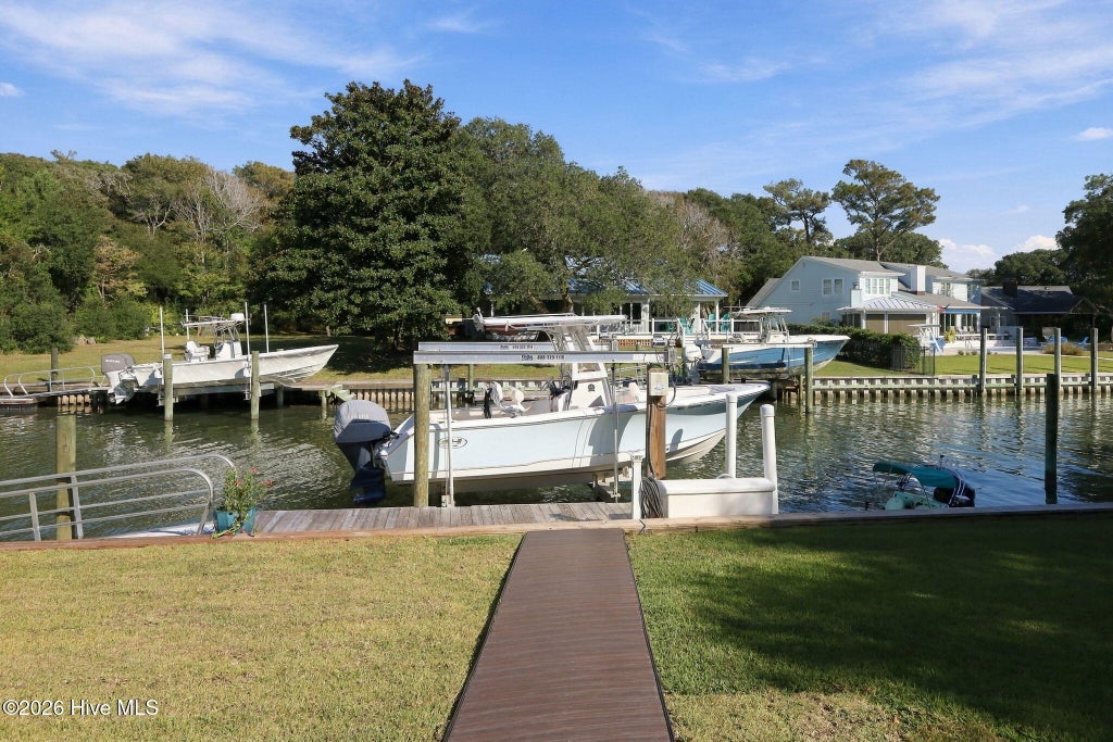 Photo of 152 Arborvitae Drive, Pine Knoll Shores, NC 28512 (MLS # 100609265)