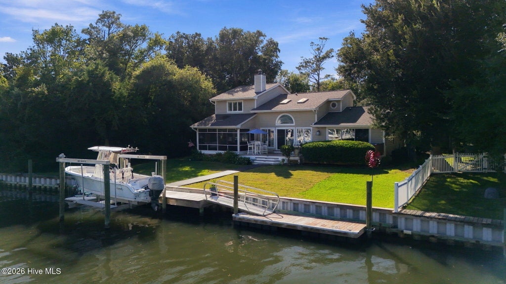 Photo of 152 Arborvitae Drive, Pine Knoll Shores, NC 28512 (MLS # 100609265)