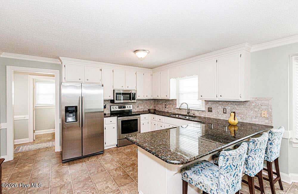 Photo of 3913 Hampton Drive, Rocky Mount, NC 27803 (MLS # 100589856)