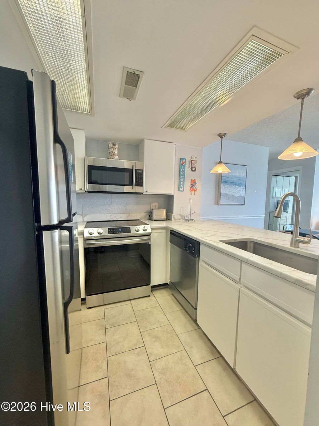 Photo of 2000 New River Inlet Road #3211, North Topsail Beach, NC 28460 (MLS # 100548396)