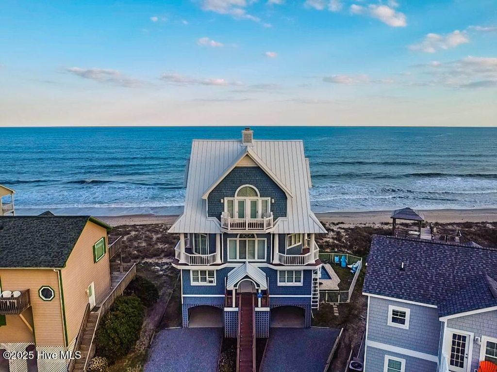Photo of 1042 New River Inlet Road, North Topsail Beach, NC 28460 (MLS # 100570987)