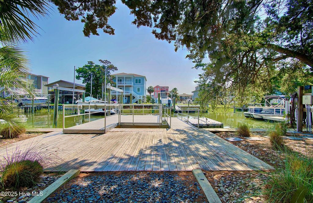 Photo of 144 Marlin Drive, Holden Beach, NC 28462 (MLS # 100521655)