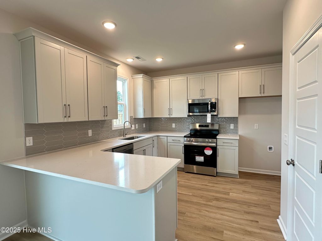 Photo of 1016 Setting Sun Boulevard NE, Winnabow, NC 28479 (MLS # 100513950)