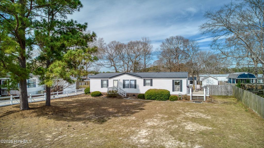 Photo of 769 Driftwood Drive, Hampstead, NC 28443 (MLS # 100557720)