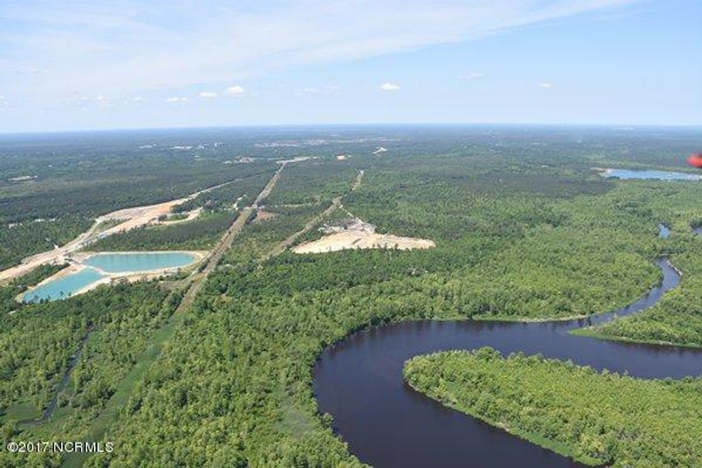 Photo of 2 Cedar Hill, Navassa, NC 28451 (MLS # 100328380)