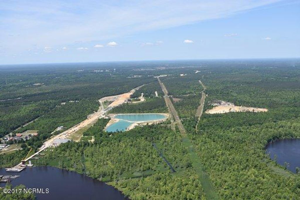 Photo of 2 Cedar Hill, Navassa, NC 28451 (MLS # 100328380)