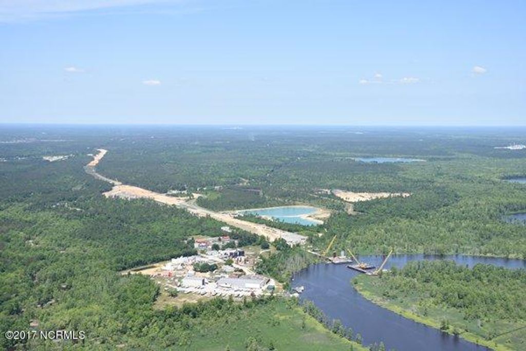 Photo of 2 Cedar Hill, Navassa, NC 28451 (MLS # 100328380)