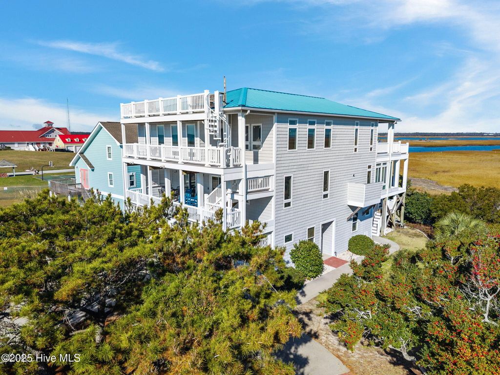 Photo of 220 Caswell Beach Road, Oak Island, NC 28465 (MLS # 100544368)