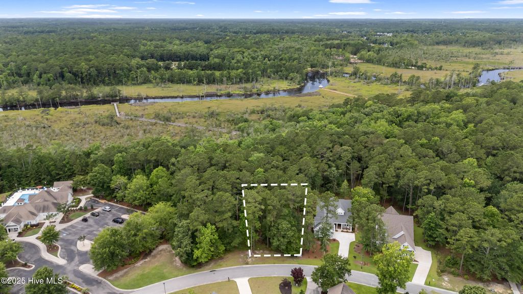 Photo of 605 Ashbury Drive SE, Bolivia, NC 28422 (MLS # 100515127)