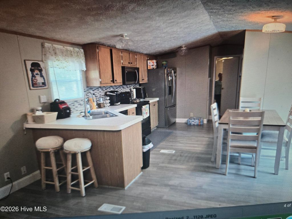 Photo of 3451 Marlin Drive SE, Bolivia, NC 28422 (MLS # 100548601)