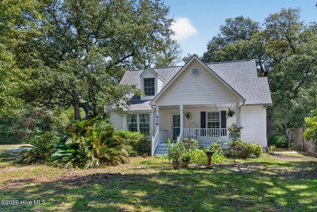 Photo of 418 Sellers Street, Oak Island, NC 28465 (MLS # 100601620)