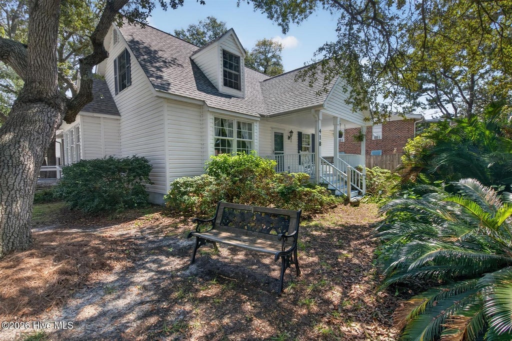 Photo of 418 Sellers Street, Oak Island, NC 28465 (MLS # 100601620)
