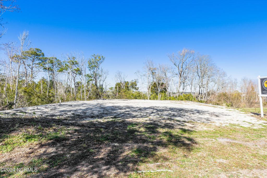 Photo of 208 Elizabeth Drive, Oak Island, NC 28465 (MLS # 100510107)