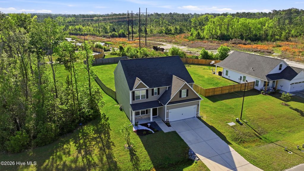 Photo of 697 Poppleton Drive, Hampstead, NC 28443 (MLS # 100568751)