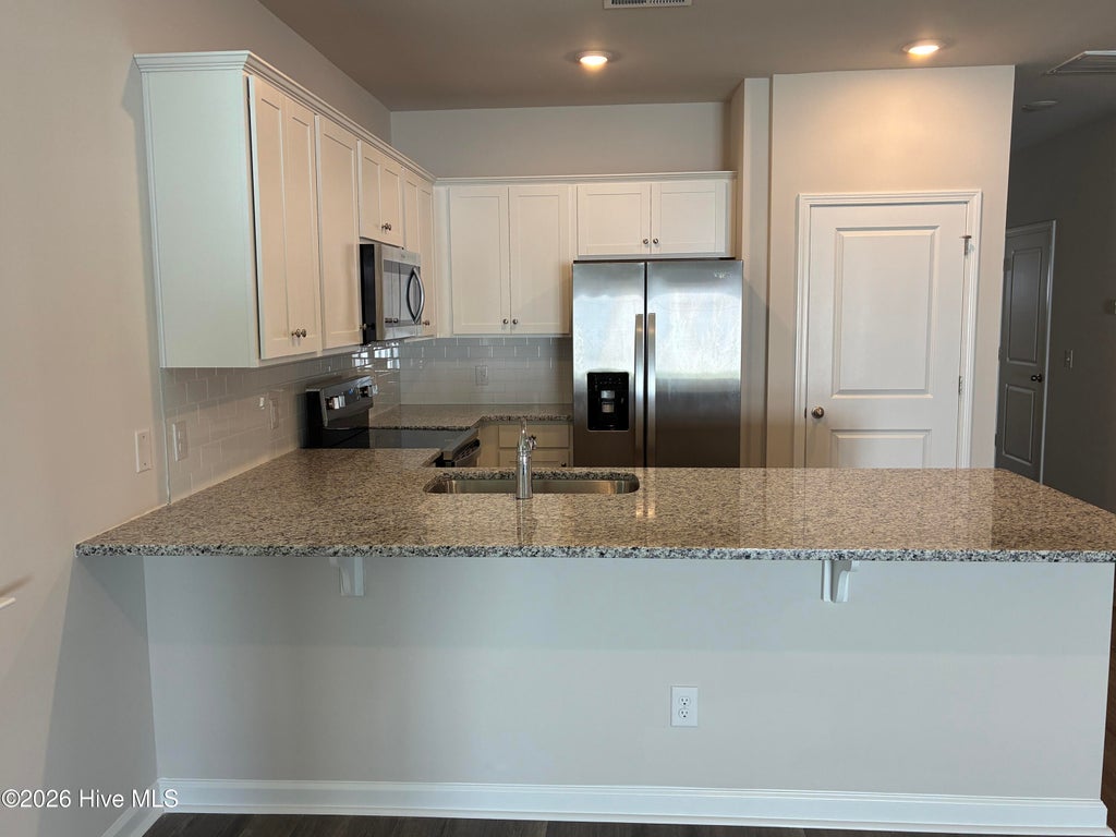Photo of 3019 Tasso Drive SW, Shallotte, NC 28468 (MLS # 100610153)