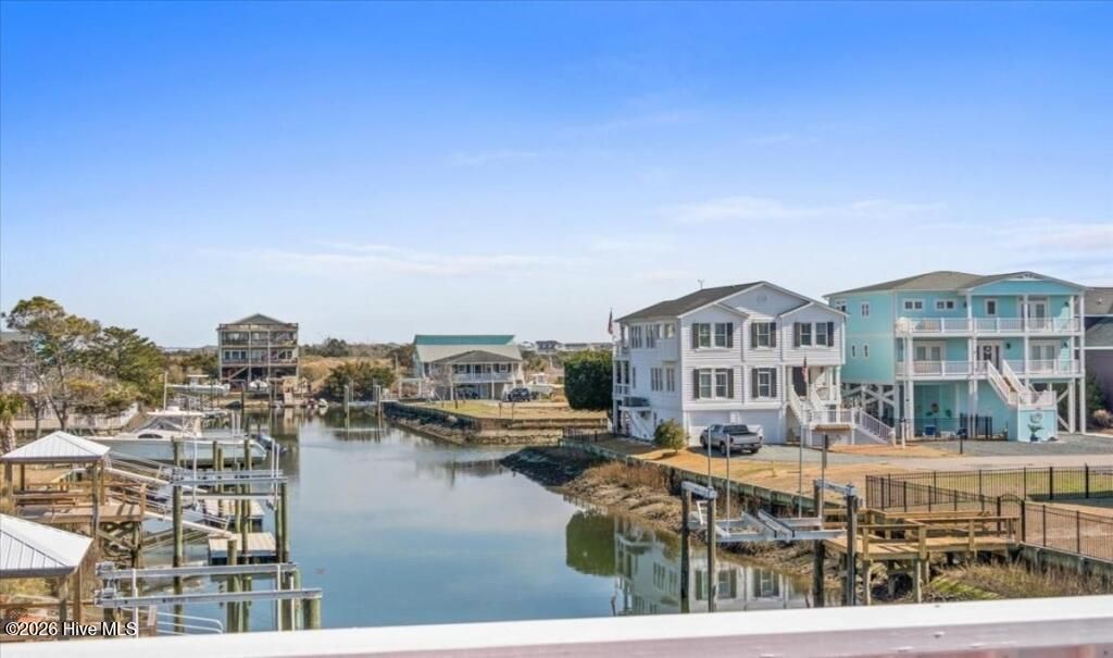 Photo of 154 Sand Dollar Street, Holden Beach, NC 28462 (MLS # 100507121)