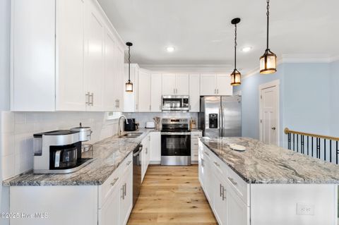 Tiny photo for 1604 Swordfish Lane #Unit 2, Carolina Beach, NC 28428 (MLS # 100545000)