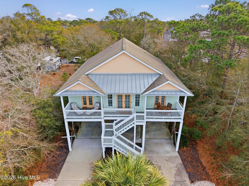 Photo of 122 NE 12th Street, Oak Island, NC 28465 (MLS # 100552701)
