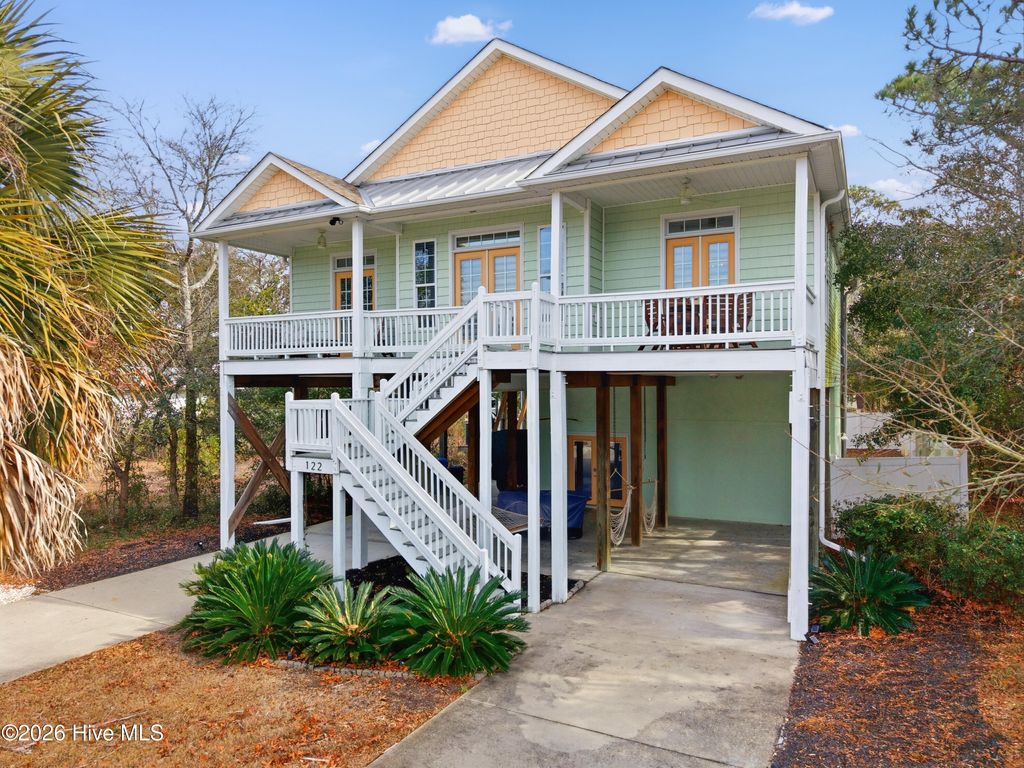Photo of 122 NE 12th Street, Oak Island, NC 28465 (MLS # 100552701)