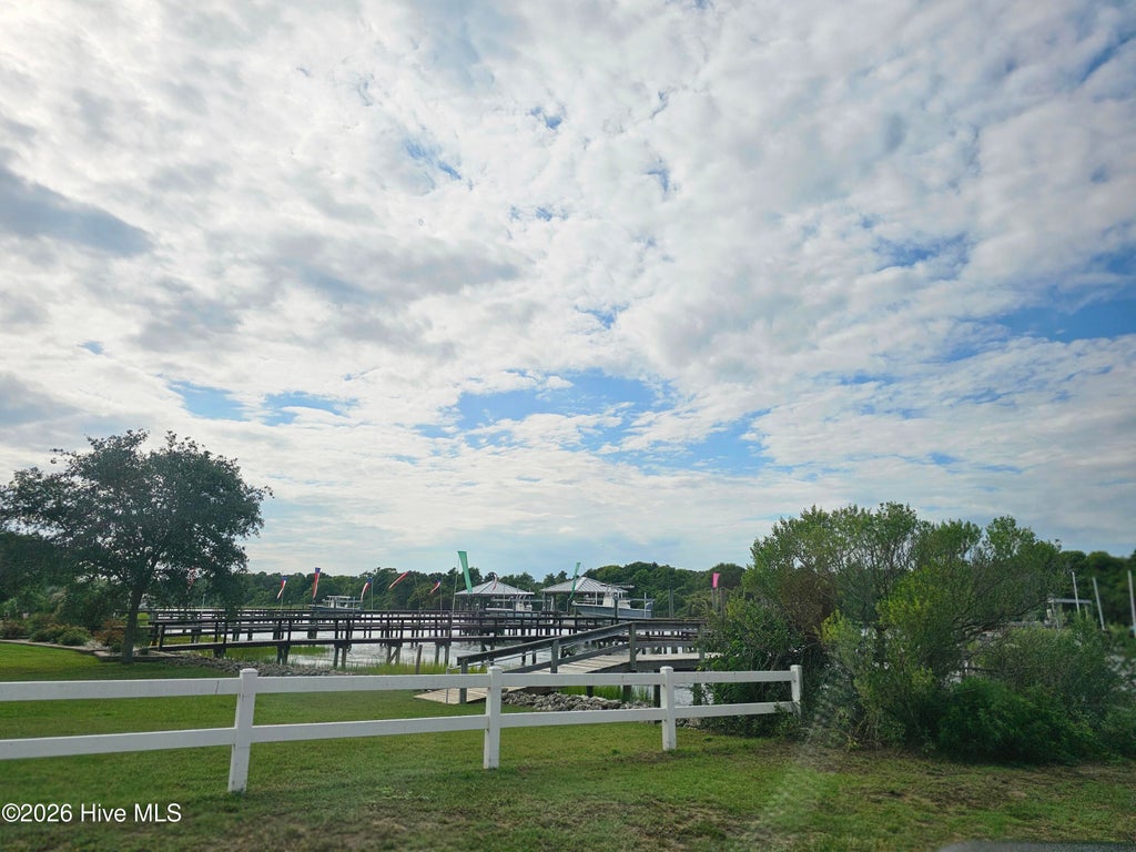 Photo of 1401 E Yacht Drive, Oak Island, NC 28465 (MLS # 100591681)