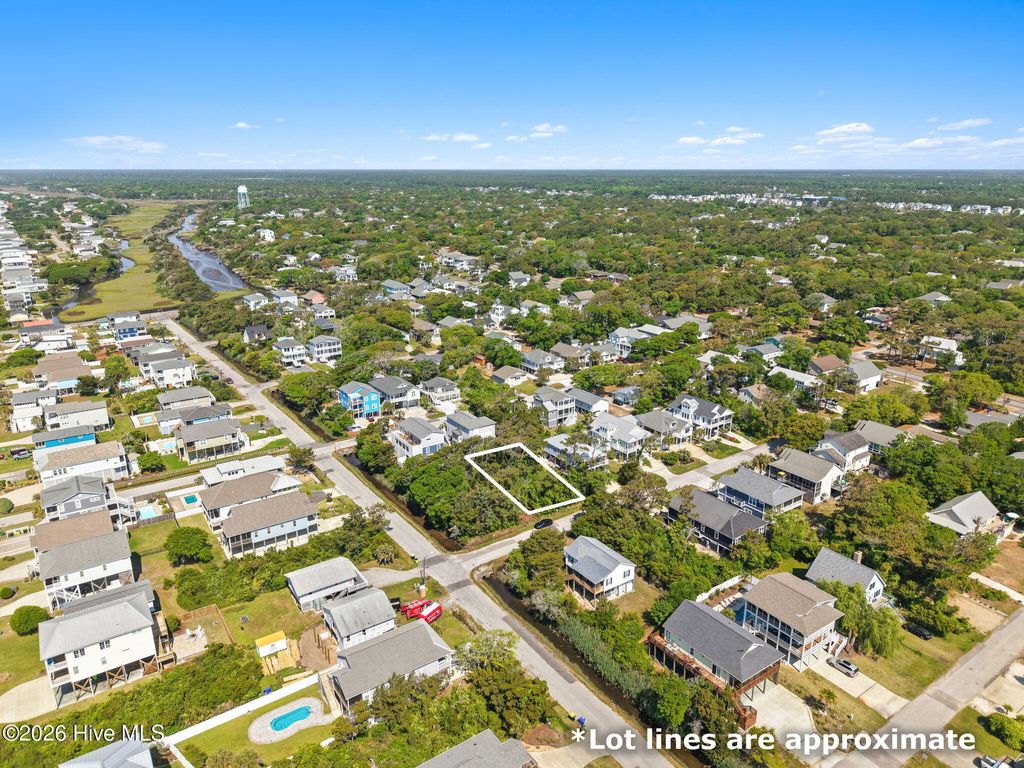 Photo of 115 SE 44th Street, Oak Island, NC 28465 (MLS # 100570264)