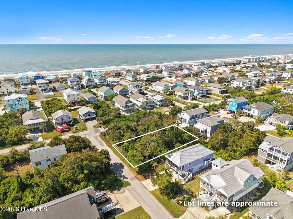 Photo of 115 SE 44th Street, Oak Island, NC 28465 (MLS # 100570264)
