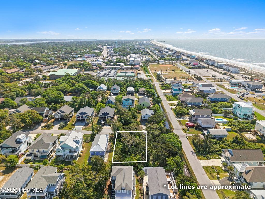 Photo of 115 SE 44th Street, Oak Island, NC 28465 (MLS # 100570264)