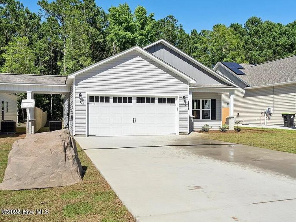 Photo of 1189 Dan Owen Drive, Hampstead, NC 28443 (MLS # 100534063)