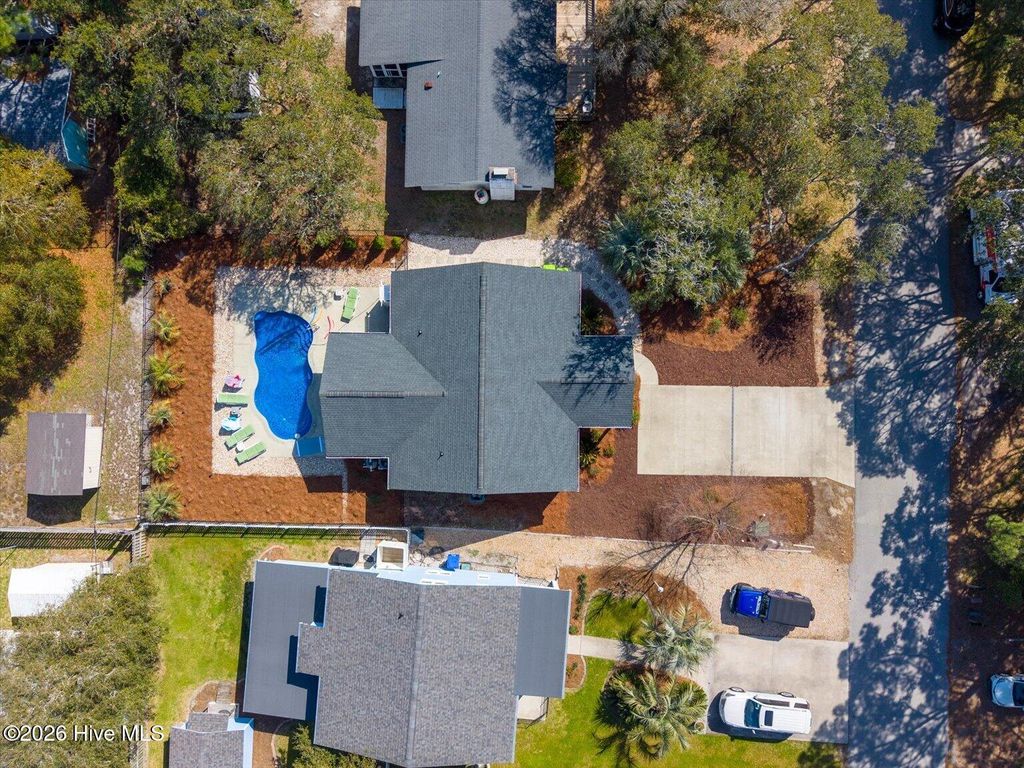 Photo of 310 Crowell Street, Oak Island, NC 28465 (MLS # 100559690)