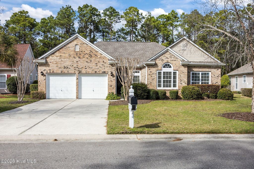 Photo of 556 Sandpiper Bay Drive SW, Sunset Beach, NC 28468 (MLS # 100555724)