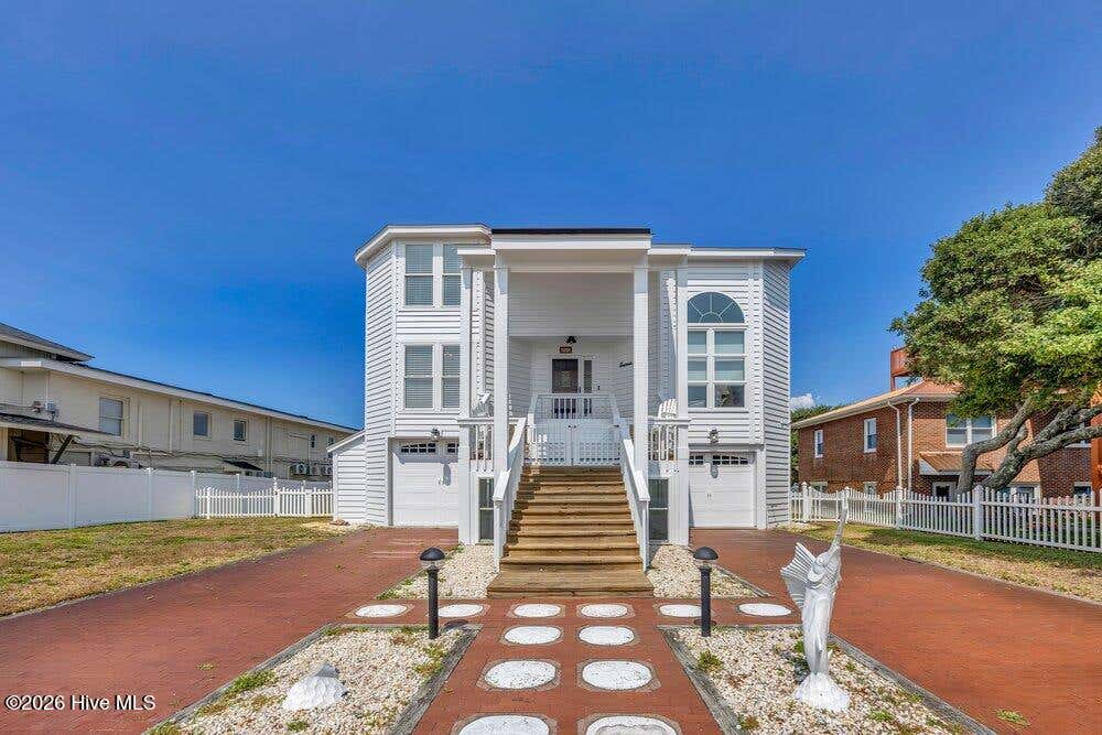 Photo of 203 Norton Street, Oak Island, NC 28465 (MLS # 100590101)