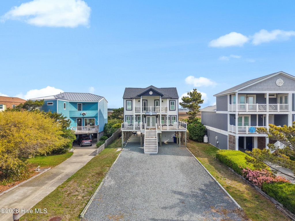Photo of 316 Caswell Beach Road, Oak Island, NC 28465 (MLS # 100565037)